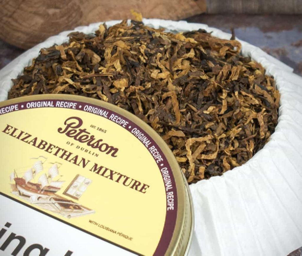 A close-up of Perique tobacco blend in a tin